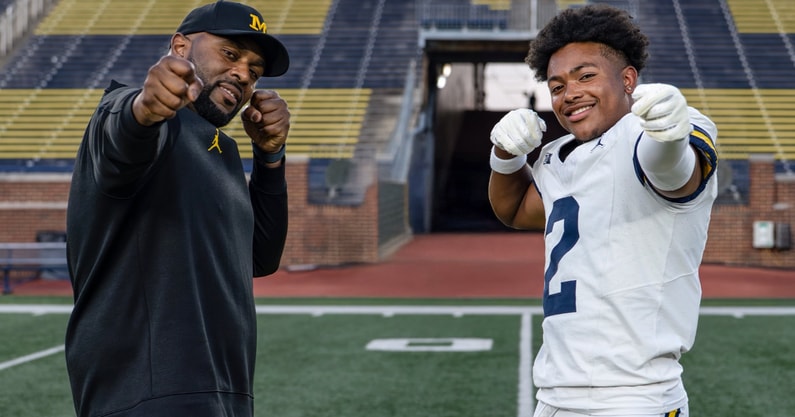 Jaylen Pile with Sherrone Moore
